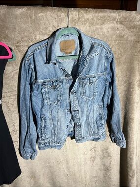 American Eagle Light Blue Denim Jacket with Tan Patch